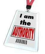 depositphotos_21848911-stock-photo-i-am-the-authority-badge.webp